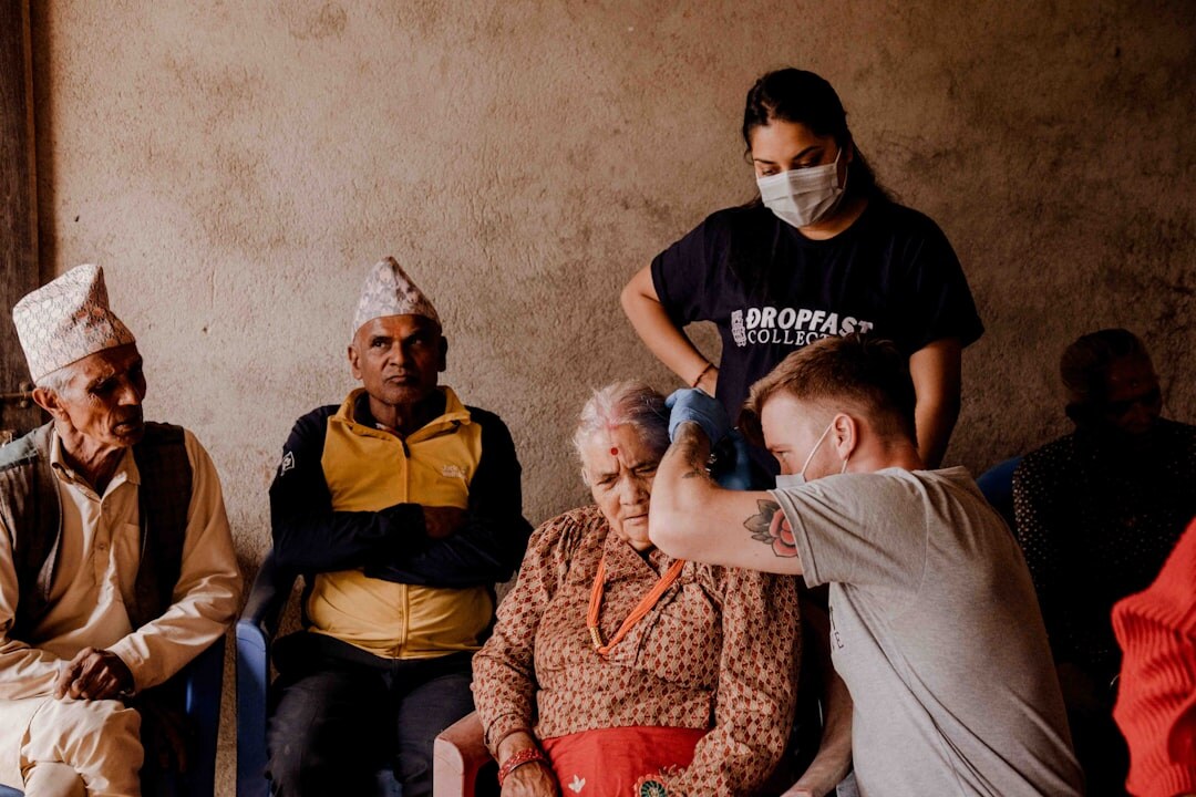 Seniors volunteering together at a community gathering