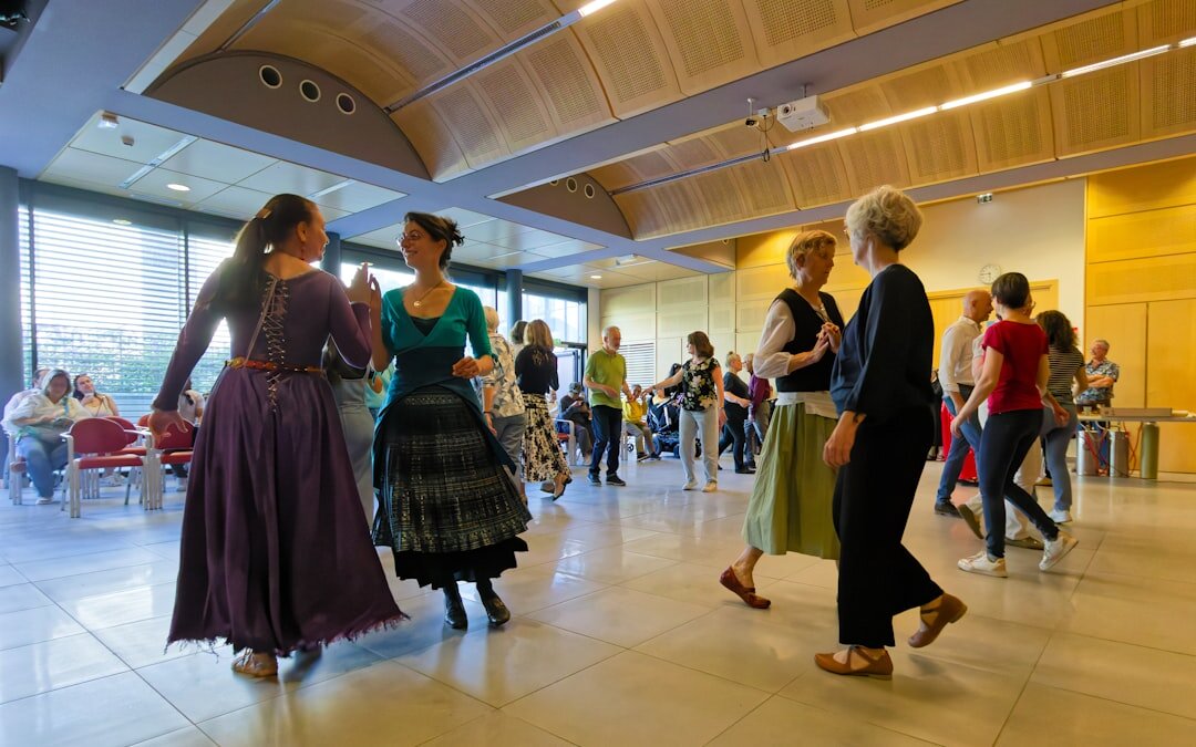 Seniors enjoying a live music and dance event indoors