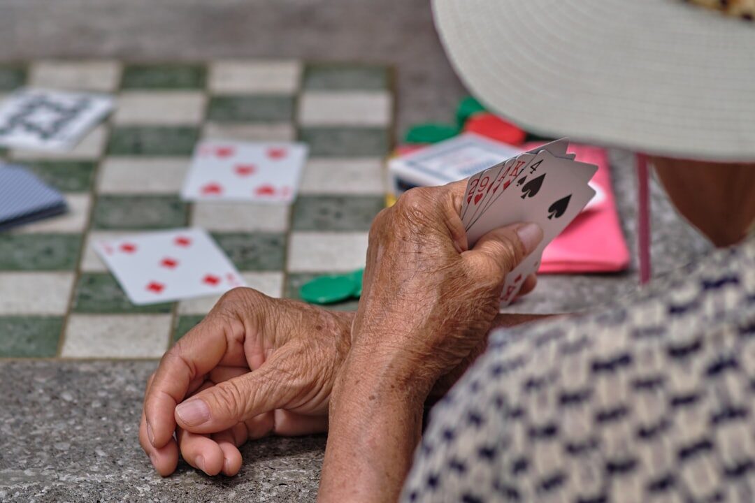 group of seniors playing cards
