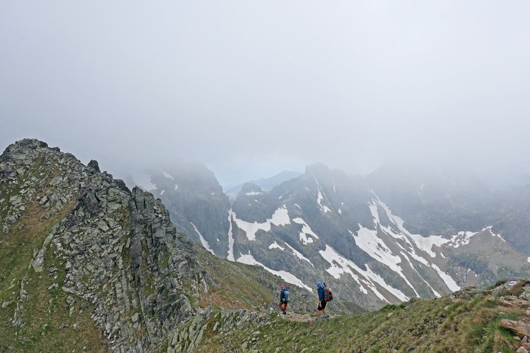 Seniors hiking a scenic trail in the Tatra mountains